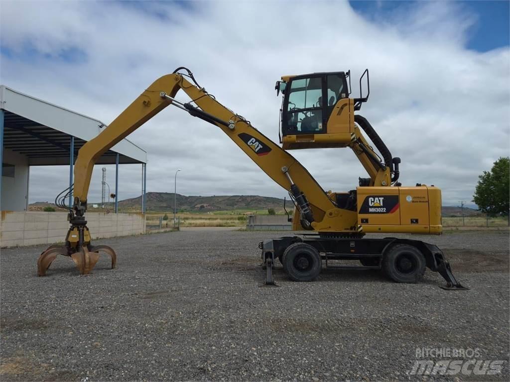 CAT MH3022 Колёсные экскаваторы