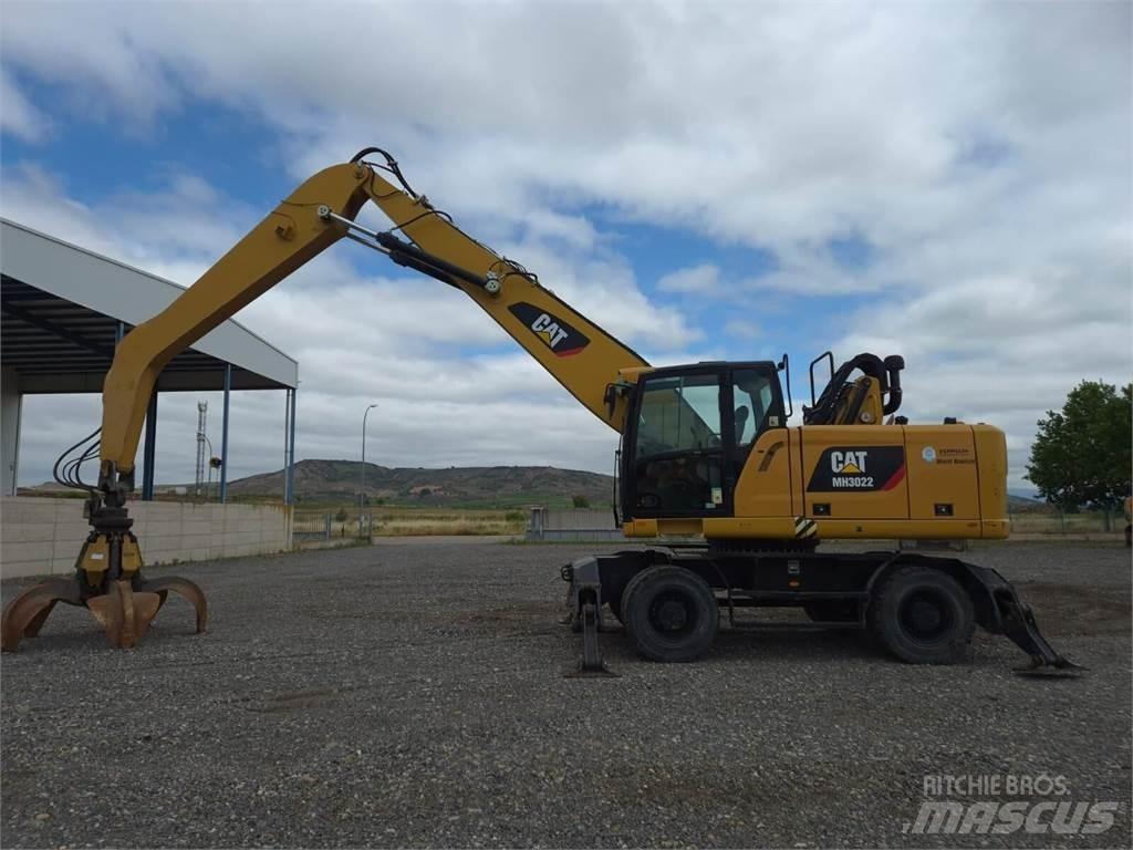 CAT MH3022 Колёсные экскаваторы