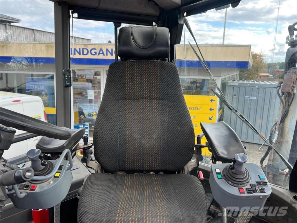 Huddig 1260 Экскаваторы-погрузчики