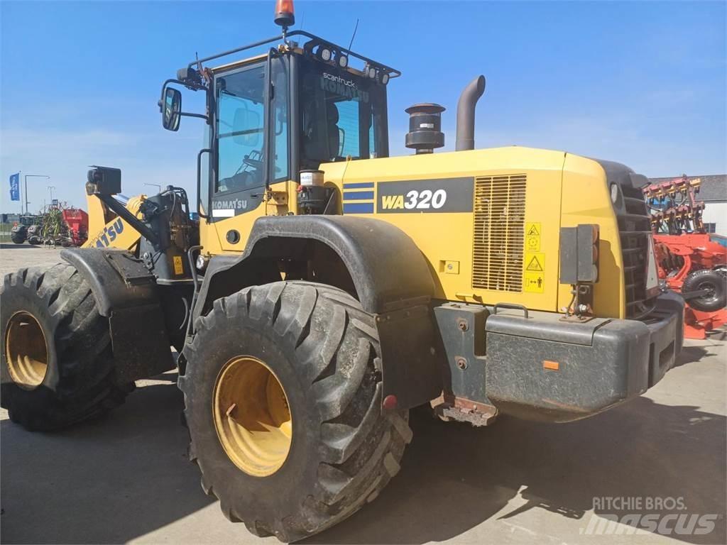 Komatsu W320 Фронтальные погрузчики