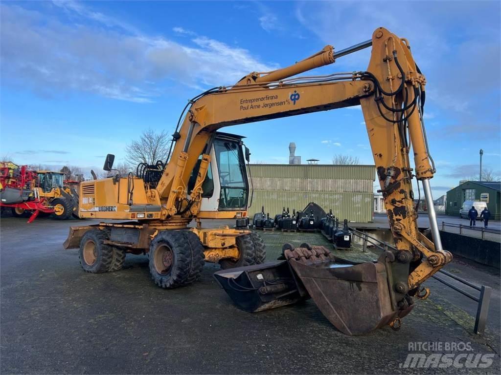 Liebherr 902 Колёсные экскаваторы