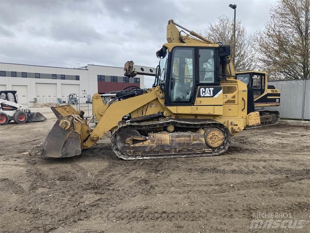 CAT 953D Гусеничные фронтальные погрузчики