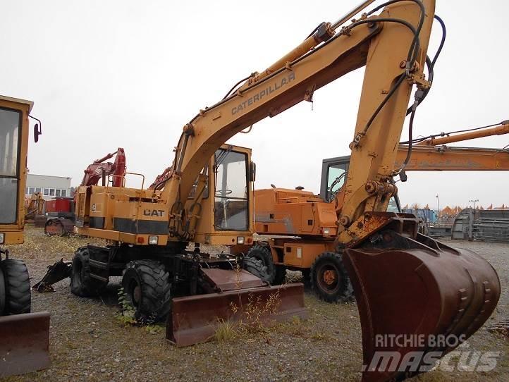 CAT 212B FT Колёсные экскаваторы