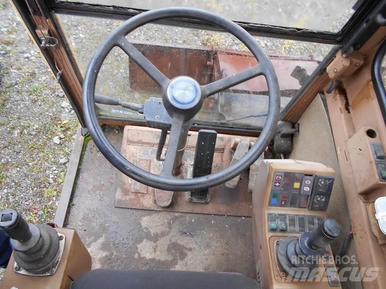 CAT 212B FT Колёсные экскаваторы