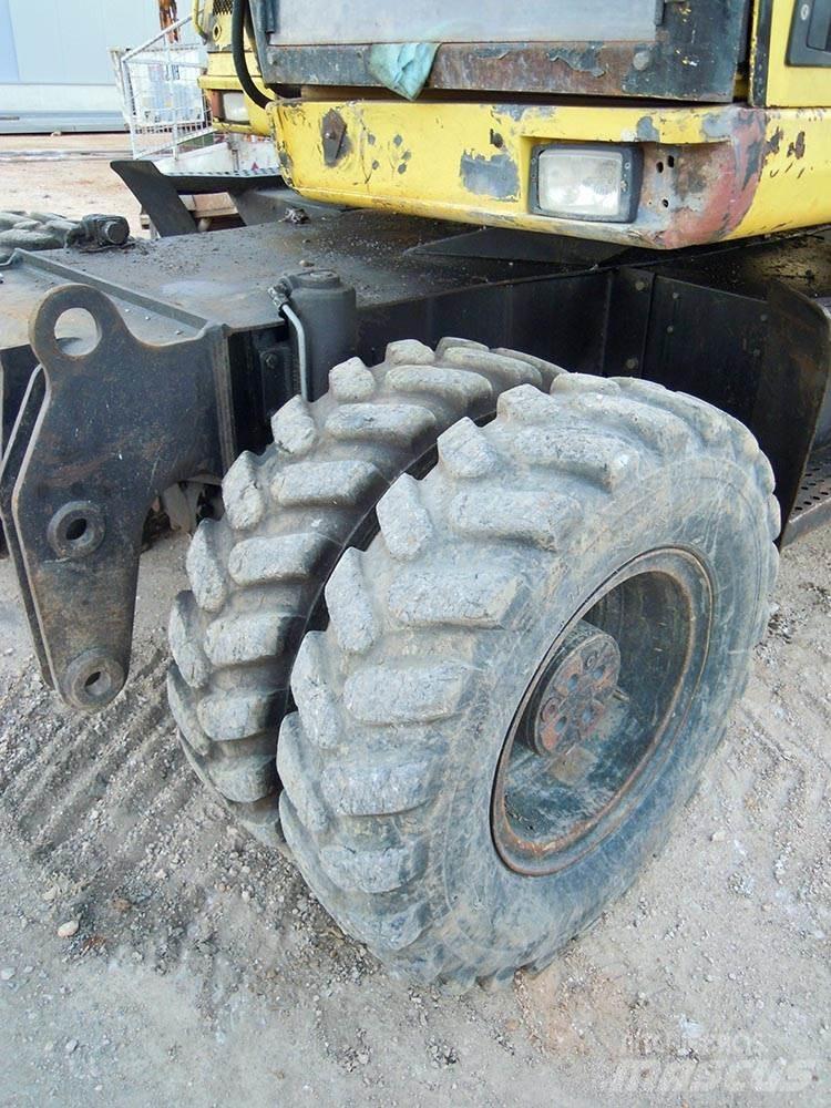 CAT M312 Колёсные экскаваторы