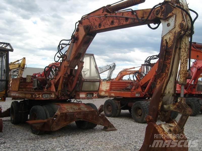 O&K MH6 Колёсные экскаваторы