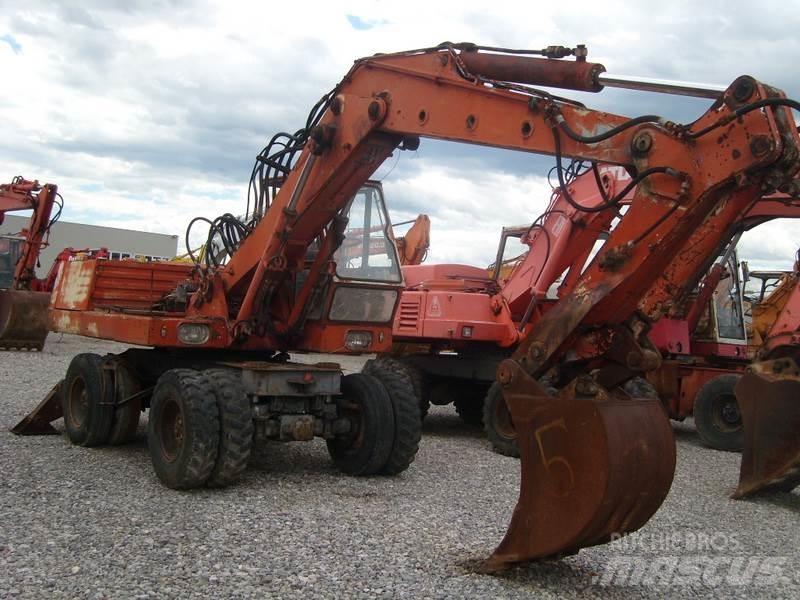 O&K MH6 Колёсные экскаваторы