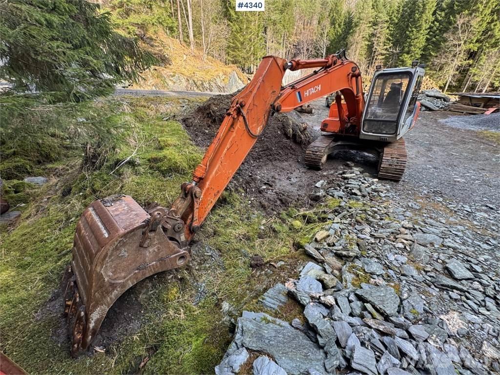 Hitachi EX120-2 Гусеничные экскаваторы