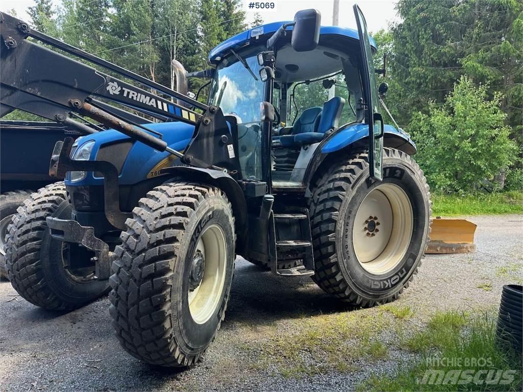 New Holland T6040 Трактора