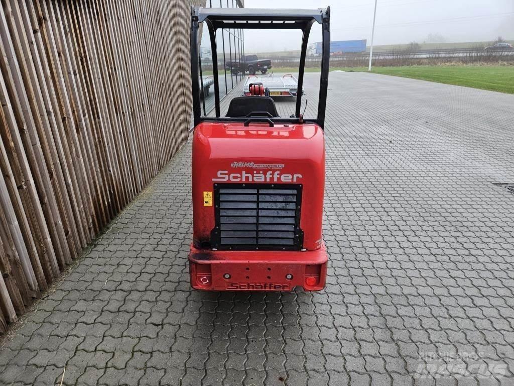 Schäffer 2428 SLT Малые погрузчики