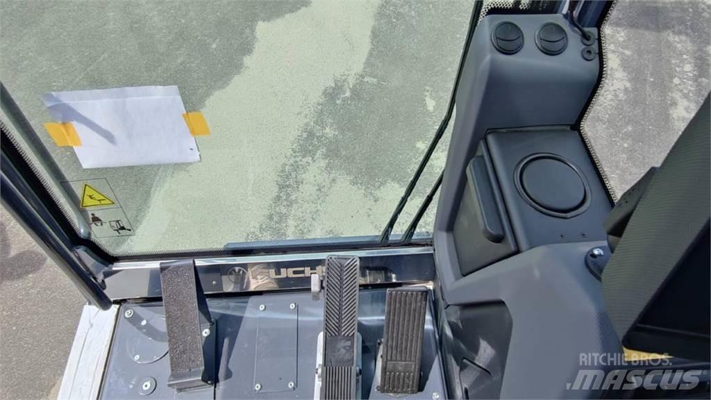 Fuchs MHL 320 Колёсные экскаваторы