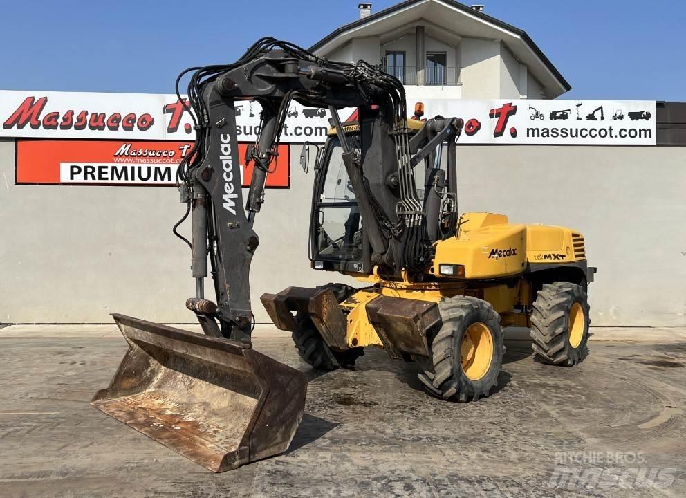 Mecalac 12MXT-E Колёсные экскаваторы