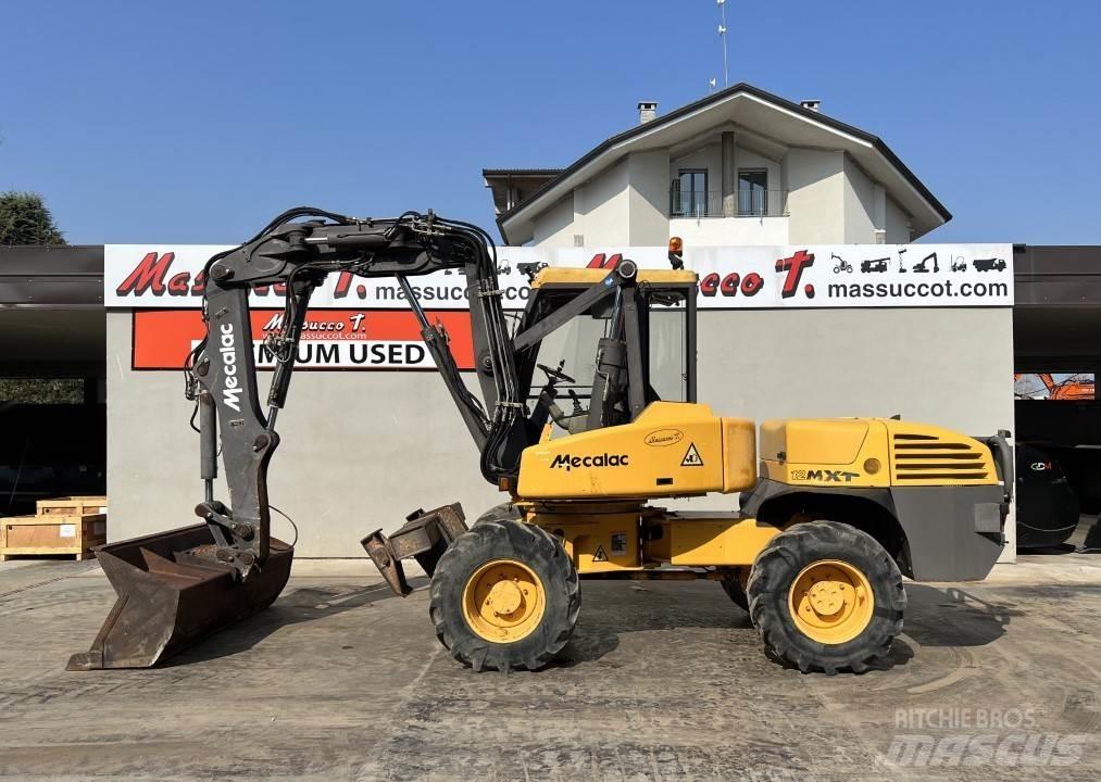 Mecalac 12MXT-E Колёсные экскаваторы