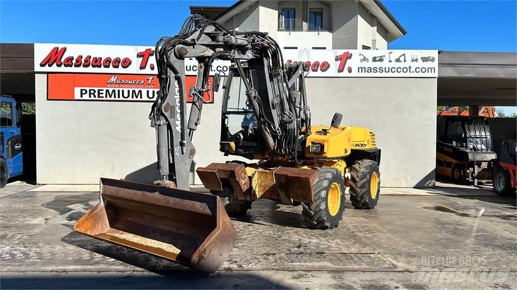 Mecalac 12MXT - E Колёсные экскаваторы