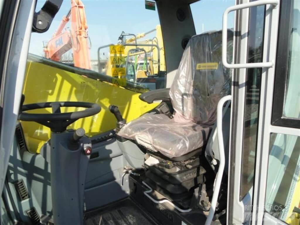New Holland WE210 Колёсные экскаваторы