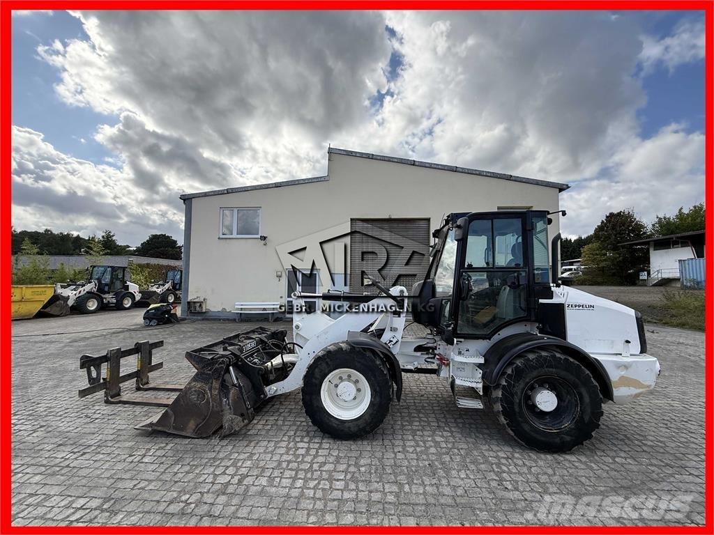 CAT 908M Фронтальные погрузчики