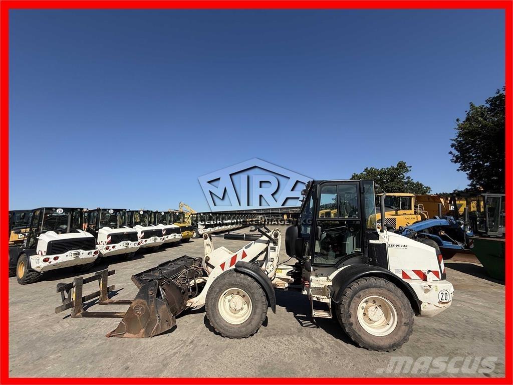 CAT 908M Фронтальные погрузчики