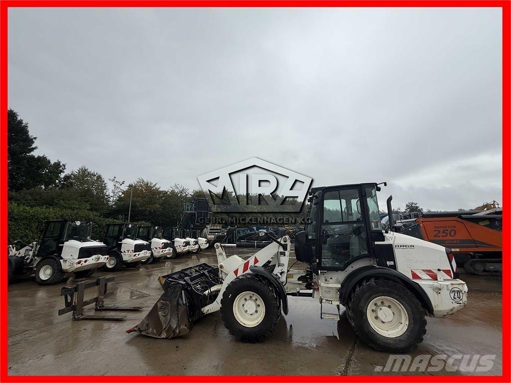 CAT 908M Фронтальные погрузчики