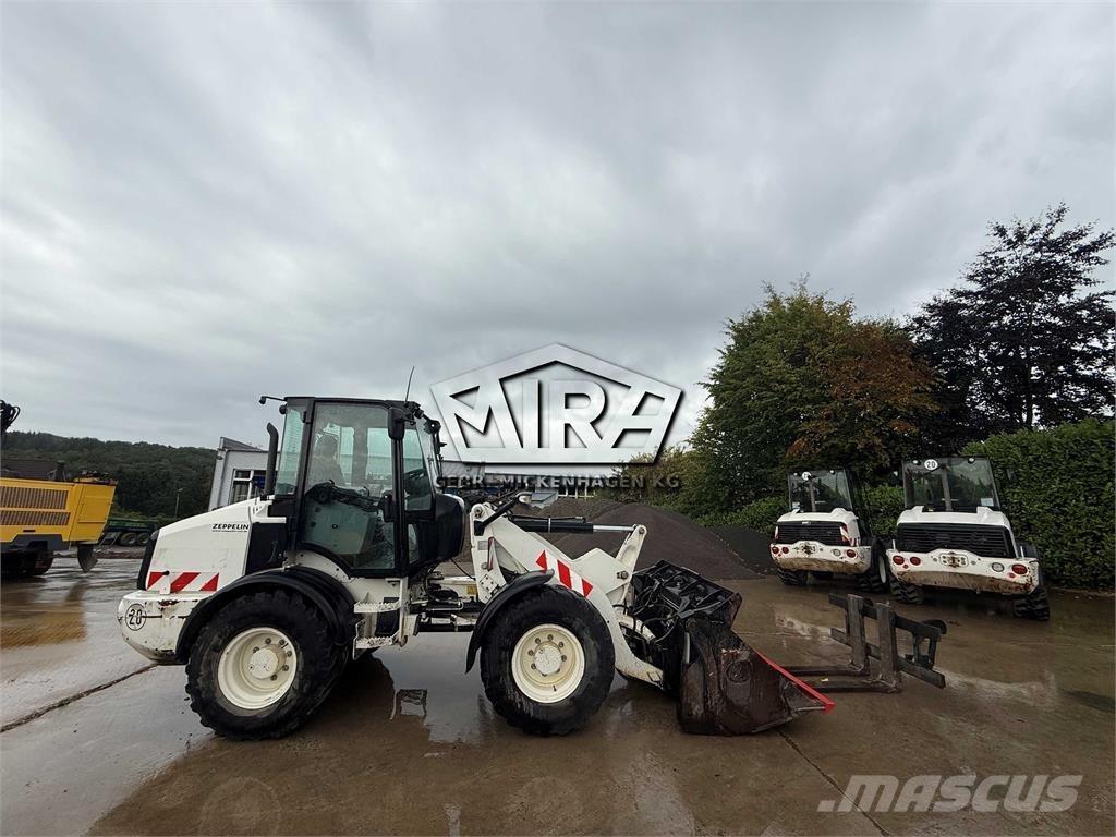 CAT 908M Фронтальные погрузчики