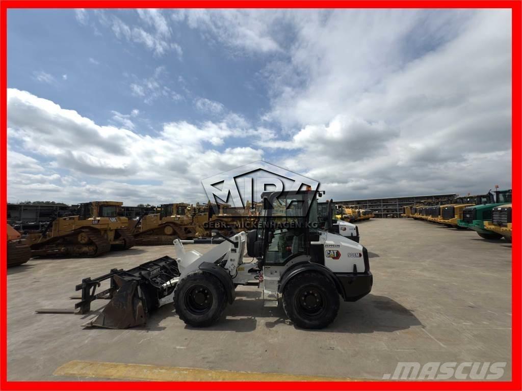 CAT 908M Фронтальные погрузчики