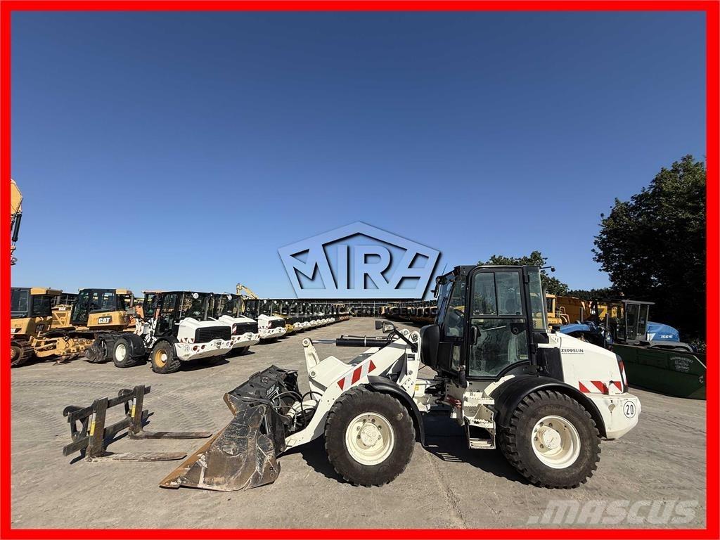CAT 908M Фронтальные погрузчики