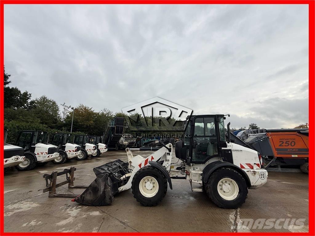 CAT 908M Фронтальные погрузчики