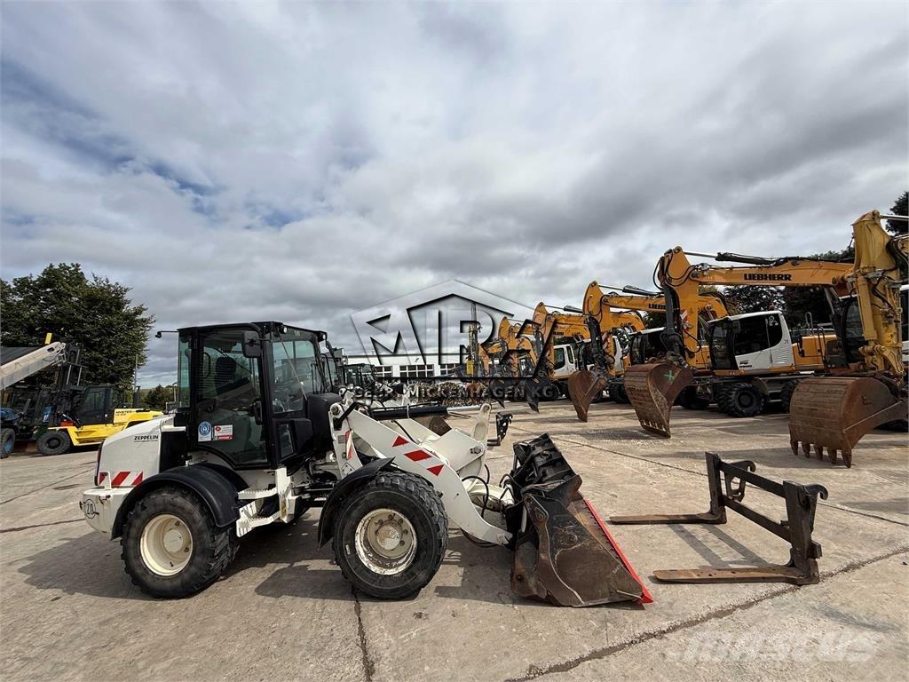 CAT 908M Фронтальные погрузчики