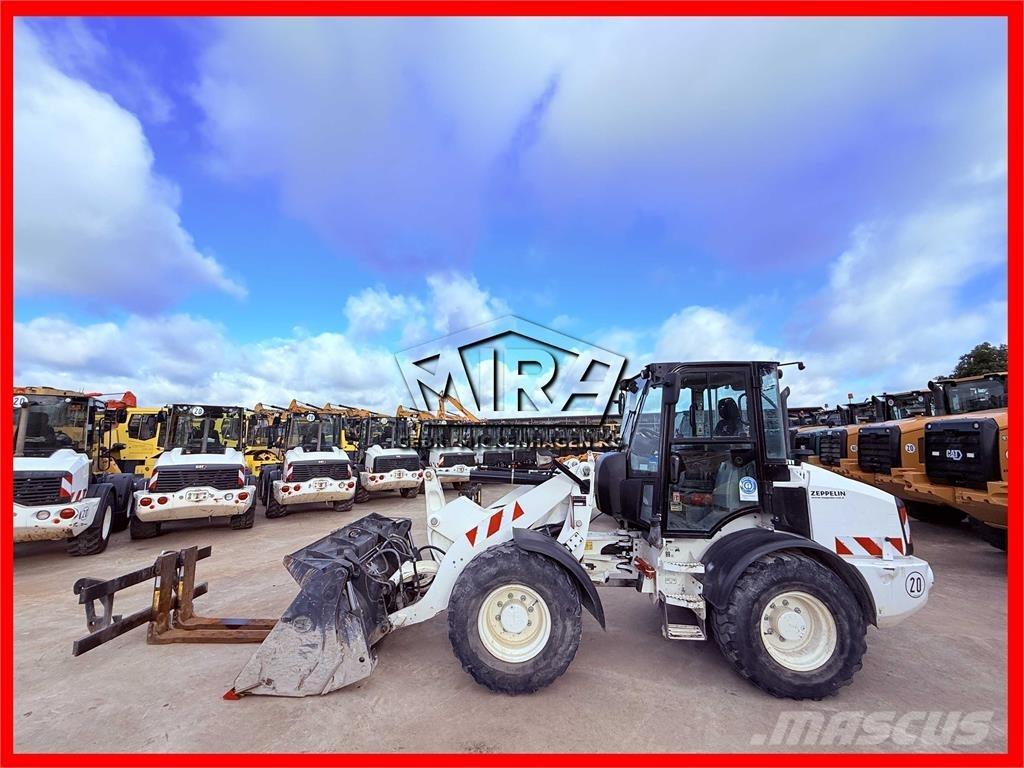 CAT 908M Фронтальные погрузчики