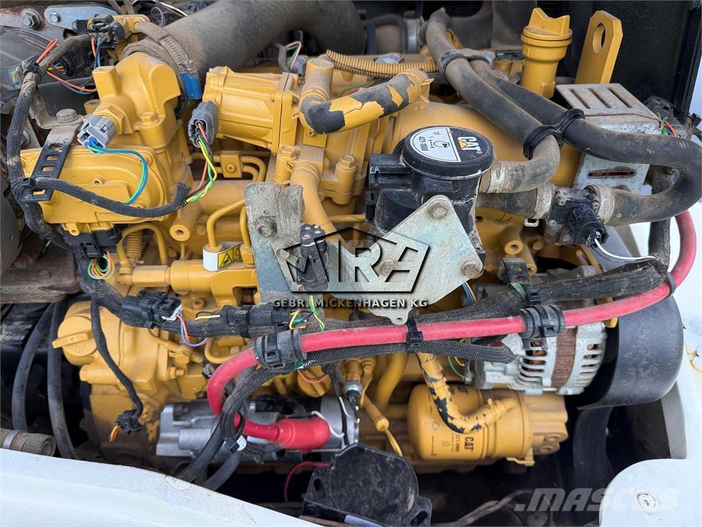 CAT 908M Фронтальные погрузчики