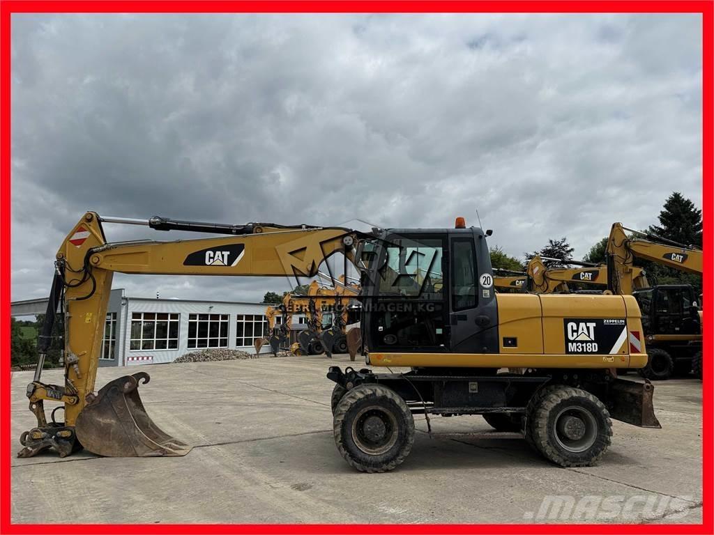 CAT M 318 D Колёсные экскаваторы
