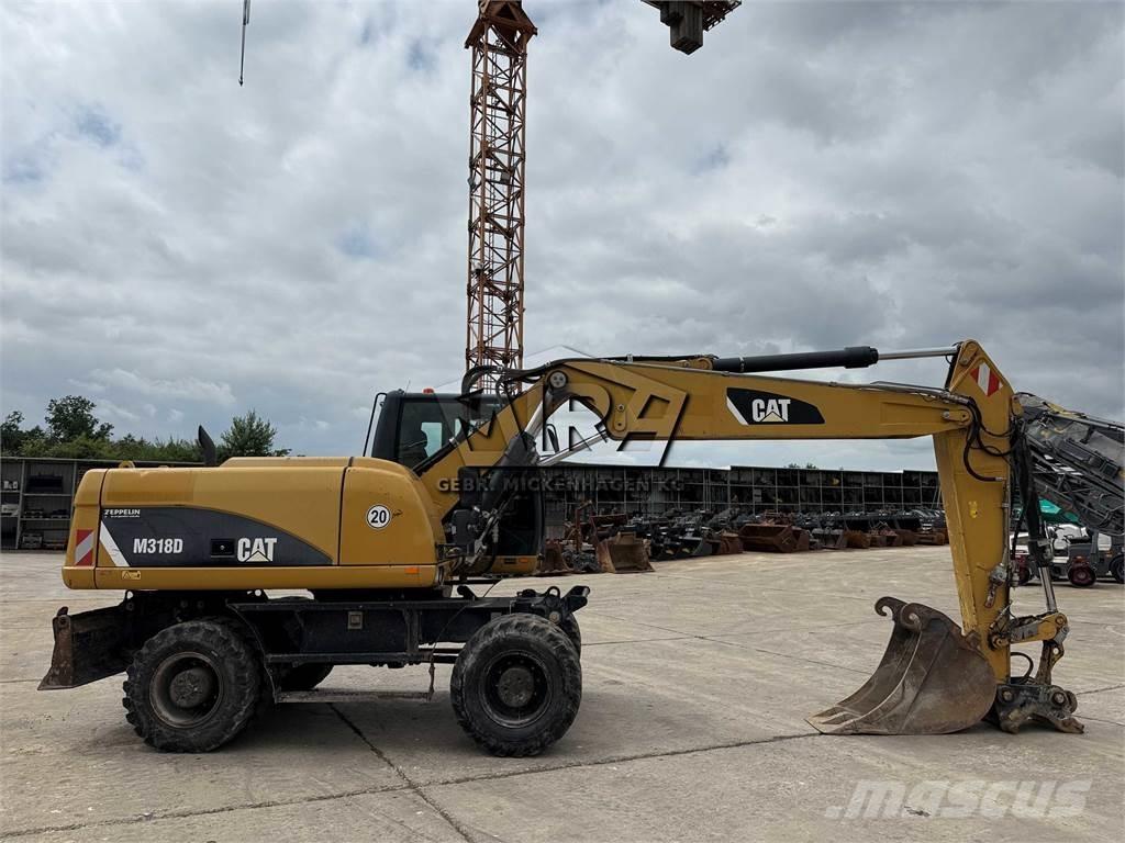 CAT M 318 D Колёсные экскаваторы