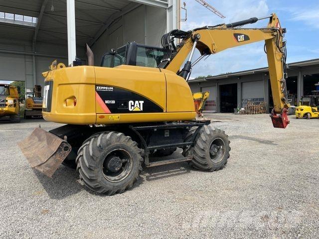 CAT 313 D Строительная техника - Другие