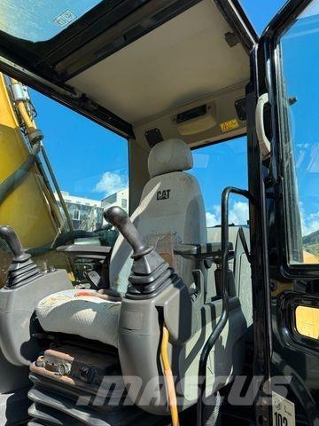 CAT 323D Гусеничные экскаваторы