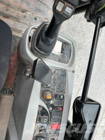 CAT 906H Колёсные экскаваторы