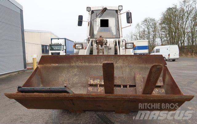CAT 910 E Фронтальные погрузчики