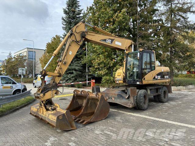 CAT M316C Строительная техника - Другие