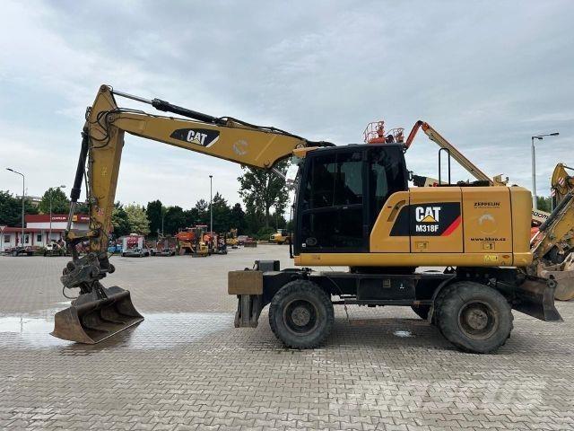 CAT M318F Строительная техника - Другие