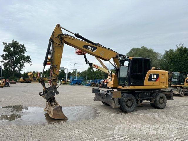 CAT M318F Строительная техника - Другие