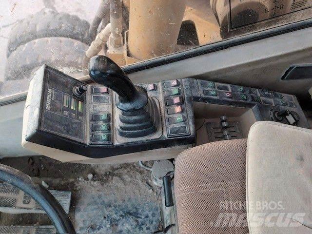 CAT M320 Колёсные экскаваторы