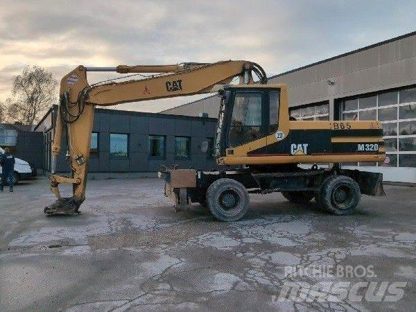 CAT M320 Колёсные экскаваторы