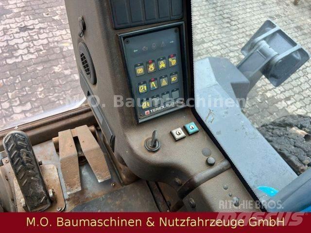 Fuchs MHL 350 Колёсные экскаваторы