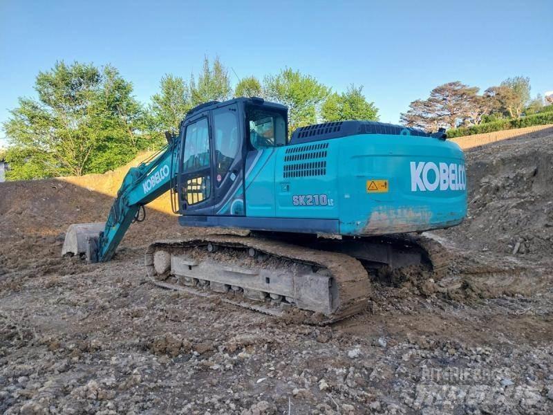 Kobelco SK210 Гусеничные экскаваторы