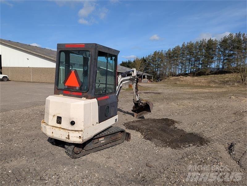 Bobcat X220 Мини-экскаваторы
