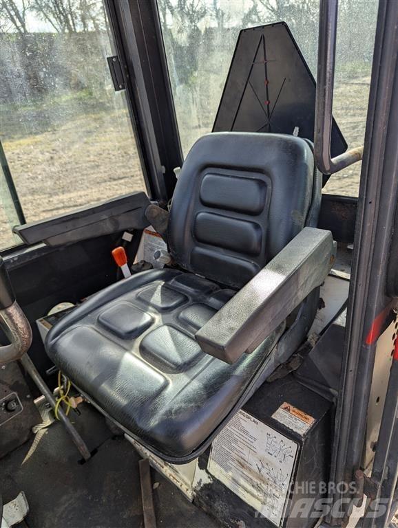 Bobcat X220 Мини-экскаваторы