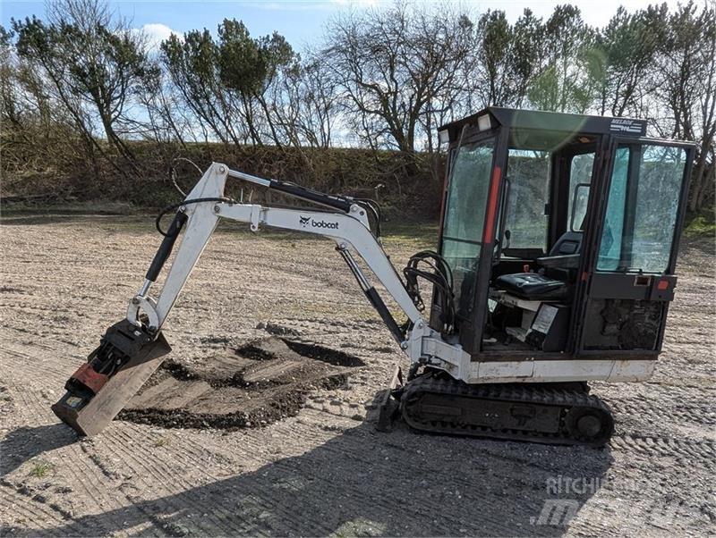 Bobcat X220 Мини-экскаваторы