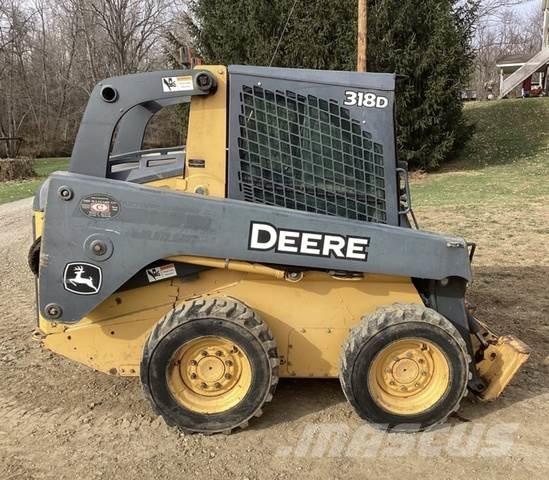 John Deere 318D Строительная техника - Другие