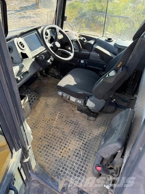 Bell B40E Шарнирно-сочленённые самосвалы