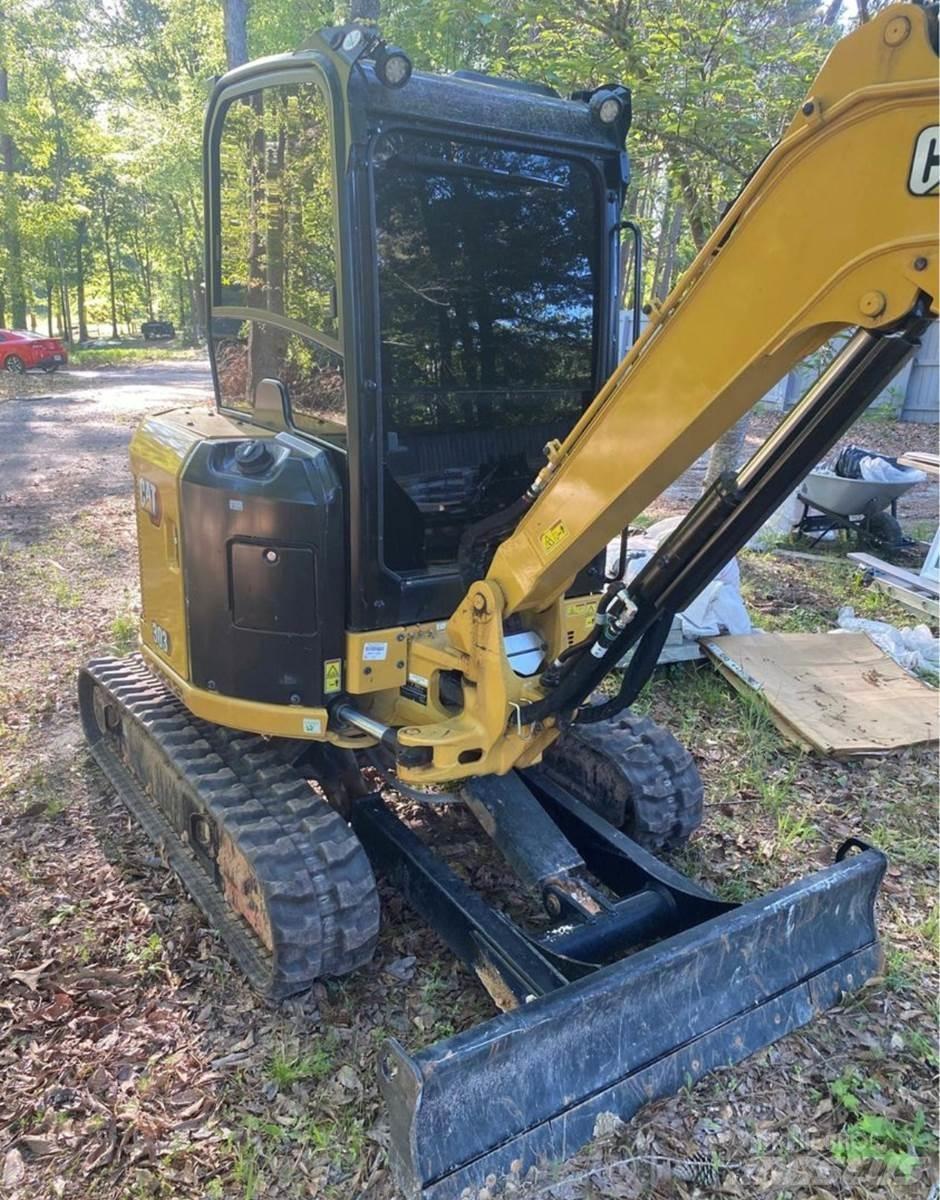 CAT 303CR Мини-экскаваторы