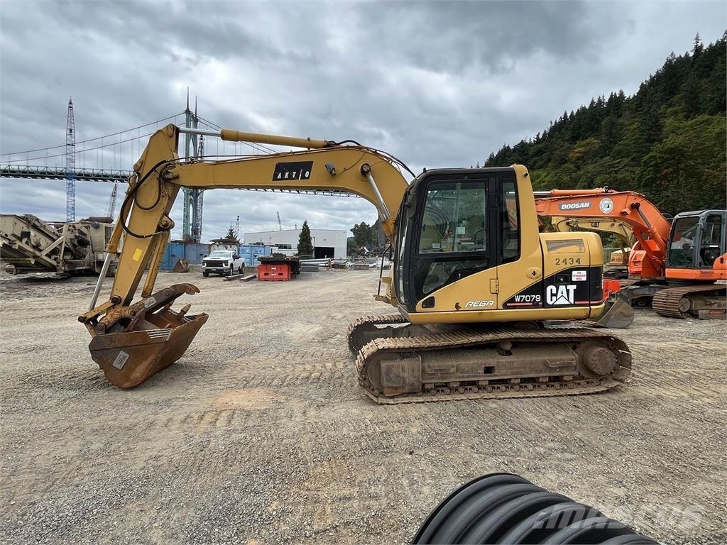 CAT 311C Гусеничные экскаваторы