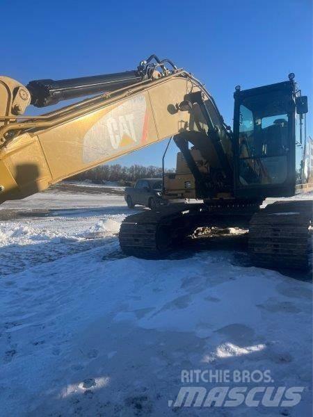 CAT 323FL Гусеничные экскаваторы